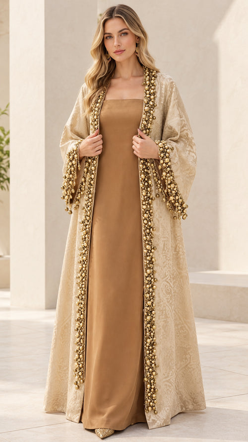 Model wearing Champagne beaded jacquard abaya set with matching inner dress, front view