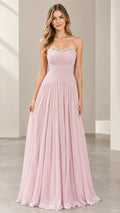 Front full view of woman wearing a strapless blush pink chiffon evening gown with beaded neckline
