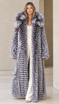 Front view of woman wearing silver grey full-length hooded faux fur maxi coat