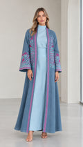 Front view of woman wearing Dusty Blue embroidered two-piece abaya set