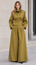 Front full-length view of woman wearing olive green cropped trench jacket and wide-leg trousers set