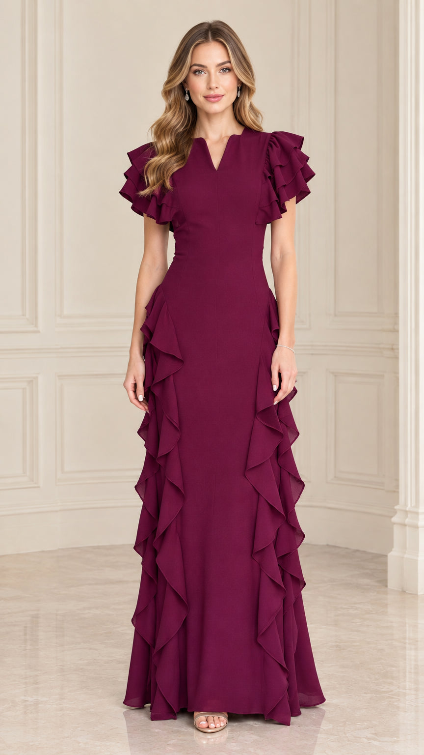 Front view of woman wearing Plum tiered flutter sleeve cascading ruffle maxi evening gown