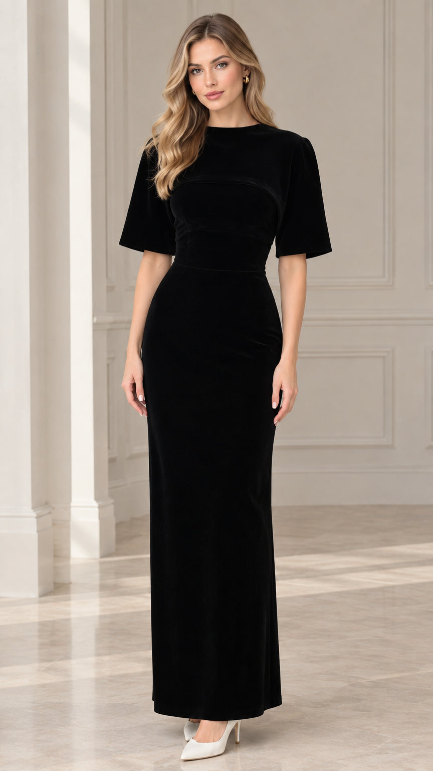 Front view of model wearing black short sleeve crew neck velvet maxi dress