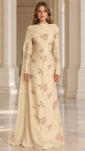 Champagne long sleeve embroidered maxi gown with shoulder drape front view