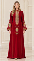 Full front view of wine red velvet embroidered kaftan maxi dress with flared sleeves