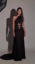 Front view of black one-shoulder evening gown with beaded sheer illusion waist and train