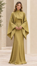 Front view of woman wearing olive green high neck cape sleeve maxi dress