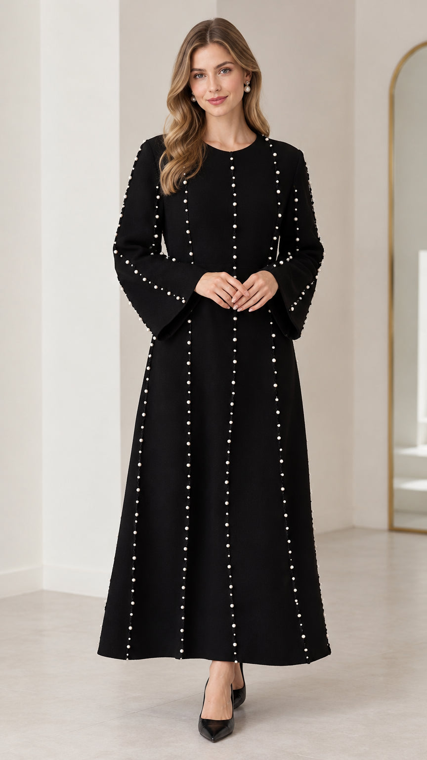 Front view of black pearl embellished long sleeve maxi dress