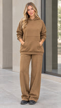 Front view of woman wearing camel fleece hoodie and wide-leg sweatpants matching lounge set