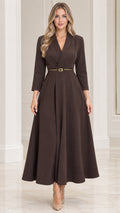 Front view of model wearing dark brown lapel collar belted A-line maxi dress