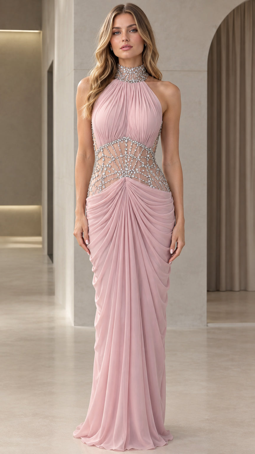Front view of model wearing Blush Pink halter maxi evening gown with rhinestone waist
