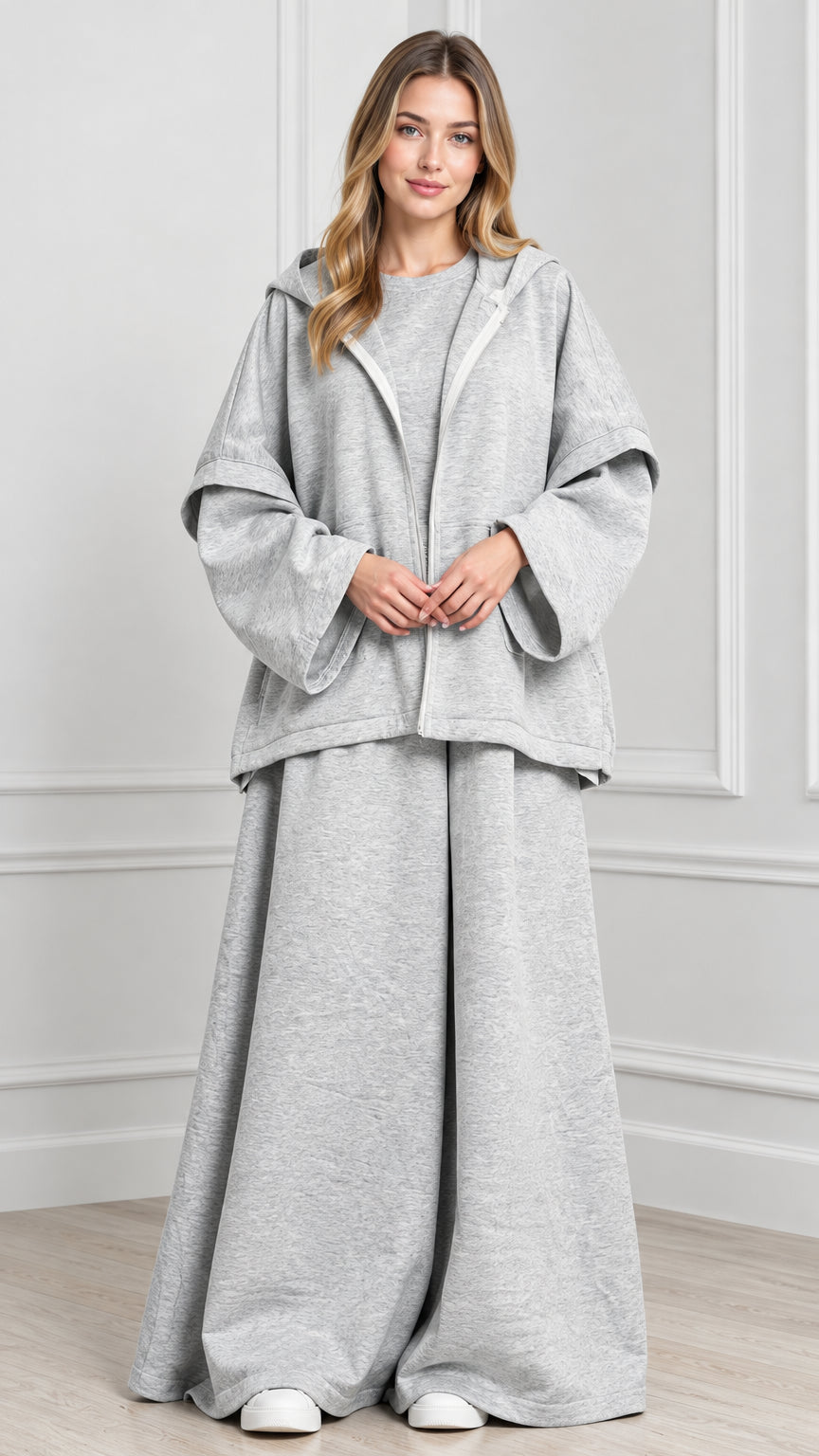 Front view of woman wearing Heather Grey hooded cape jacket and wide-leg lounge set