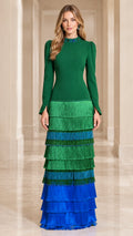 Front view of model wearing Emerald Green embellished high neck tiered fringe maxi dress
