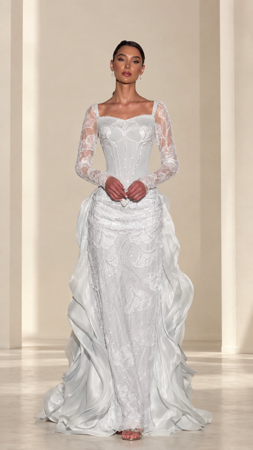 Front view of ice blue embroidered corset evening gown with lace sleeves and ruffled skirt