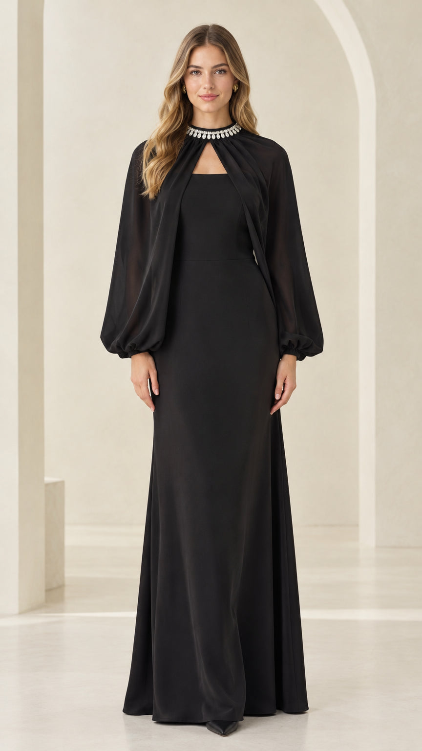 Front full-length view of woman wearing black rhinestone collar cape evening maxi dress