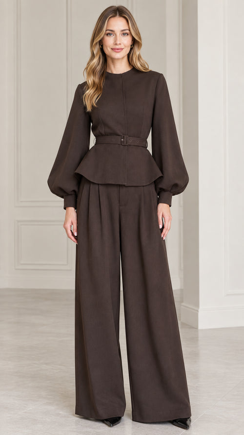 Front full-length view of model wearing Dark Brown belted peplum top and wide-leg trousers set