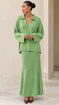 Front full view of model wearing Sage Green polo sweater and maxi knit skirt set