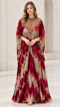 Front view of model wearing Burgundy embellished velvet kaftan maxi dress