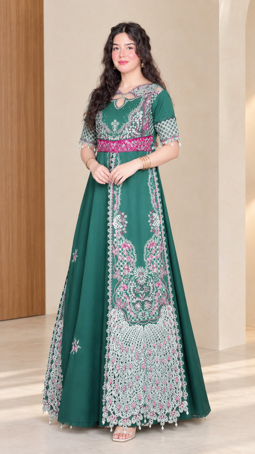 Front full view of woman wearing emerald green embroidered maxi dress with keyhole neckline