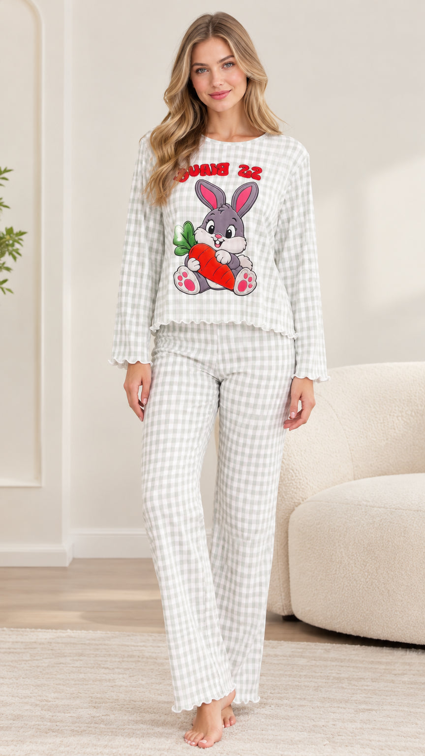 Front full-length view of woman wearing sage green gingham bunny pajama set