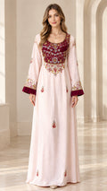 Full front view of model wearing Blush Pink embroidered velvet yoke kaftan maxi dress