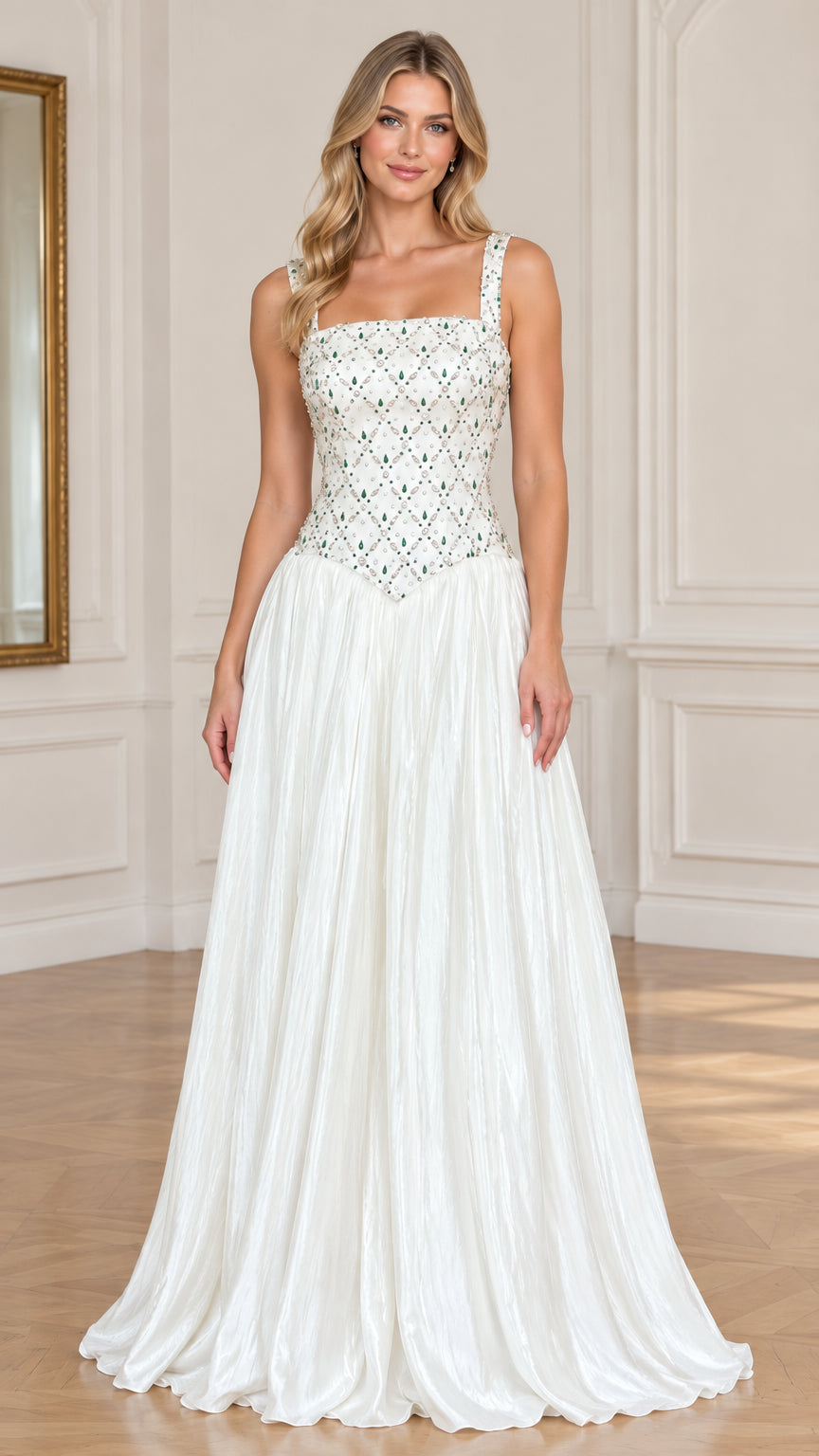 Front view of model wearing white embellished basque waist pleated evening gown