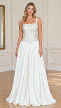 Front view of model wearing white embellished basque waist pleated evening gown