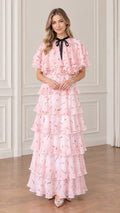 Pink floral tiered chiffon maxi dress with capelet overlay and bow tie front view