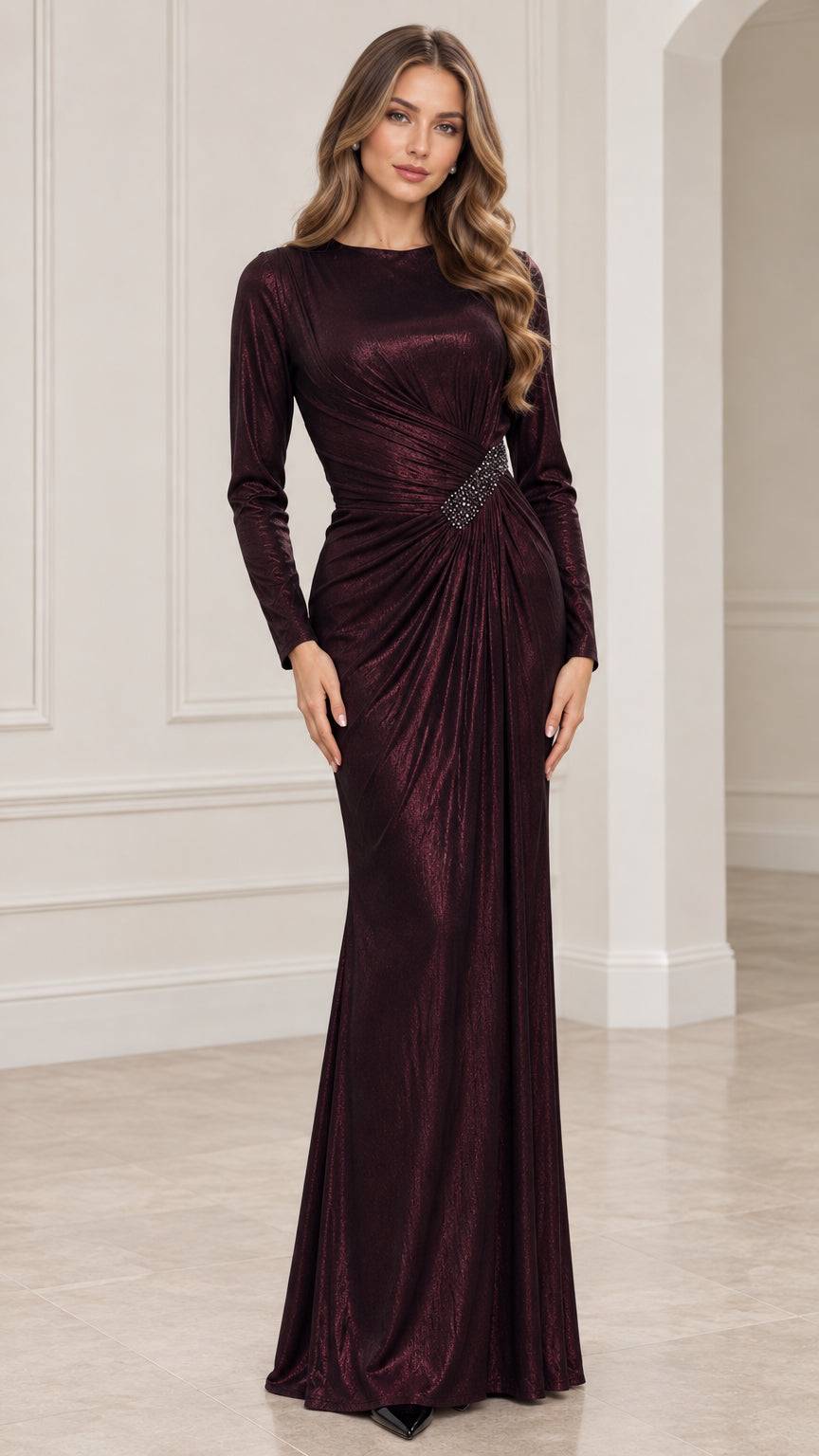 Front view of model wearing Burgundy long sleeve metallic shimmer maxi evening gown with ruched waist