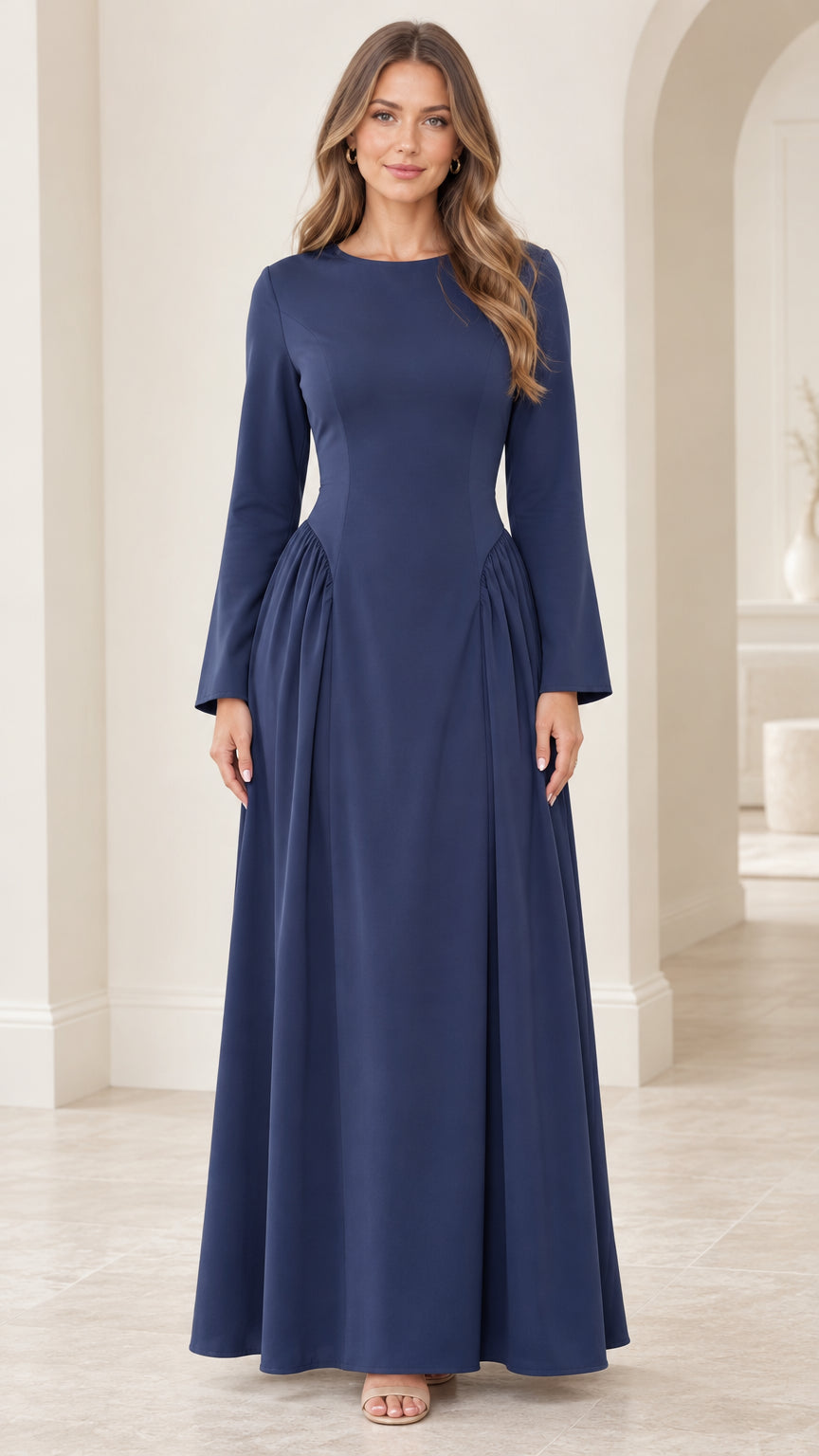 Front view of woman wearing navy blue long sleeve corset back maxi dress