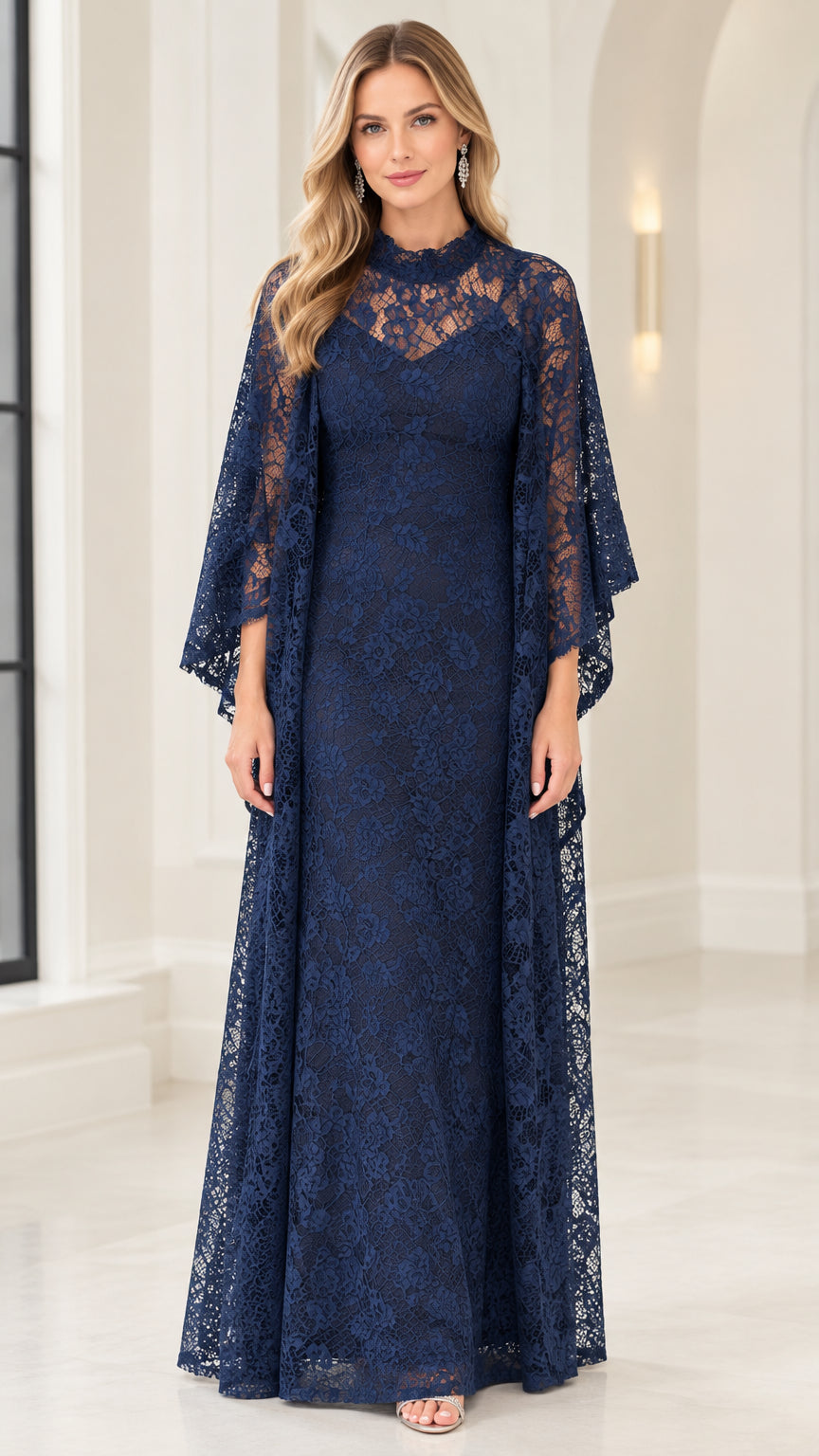 Front view of model wearing Navy Blue floral lace mock neck evening gown with cape overlay