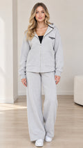 Front full view of woman wearing Heather Grey fleece zip-up hoodie and wide-leg pants set