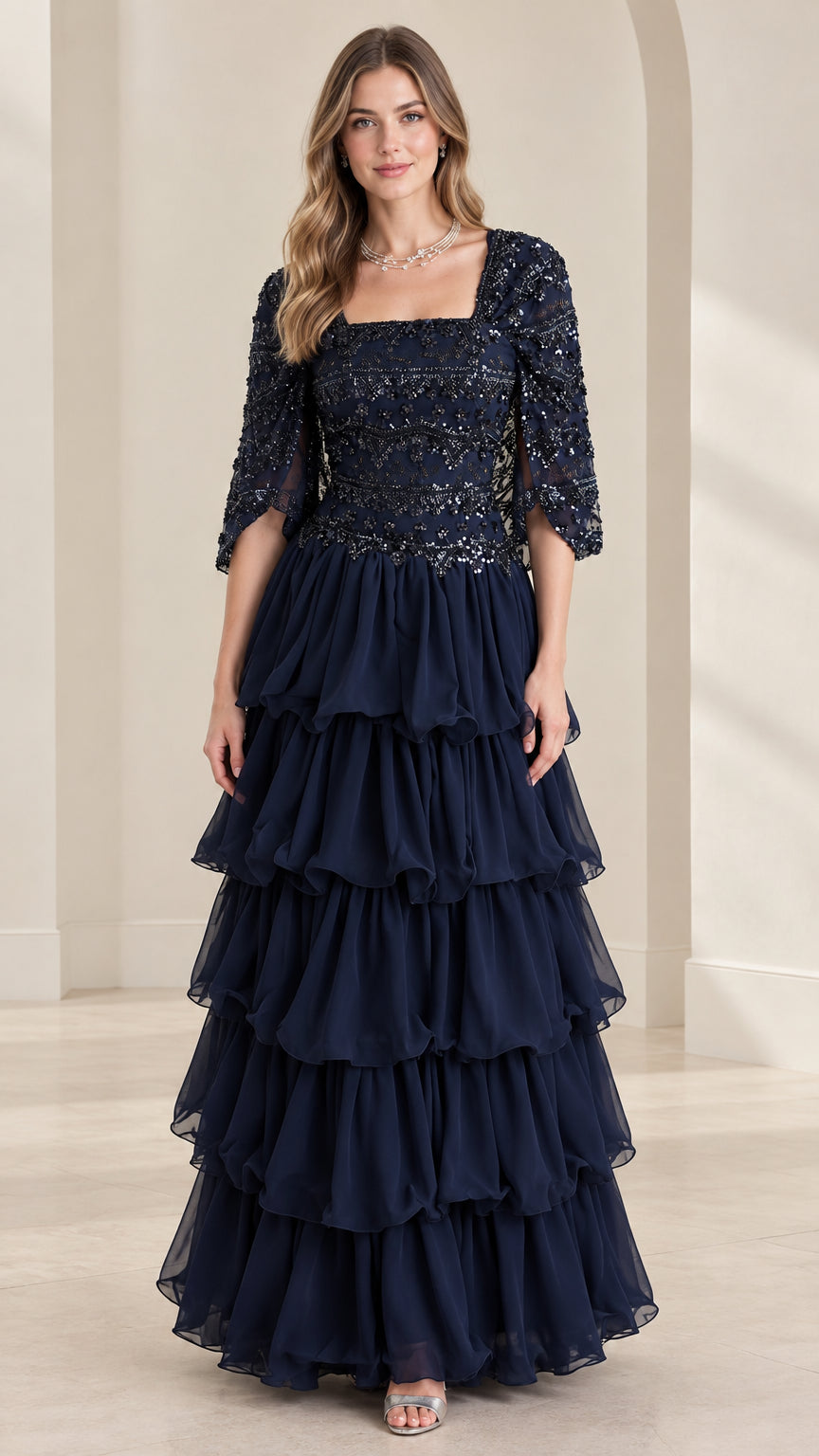 Full front view of navy blue sequin beaded tiered ruffle formal evening gown