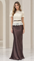 Front view of model wearing chocolate brown and cream lace mock neck evening gown with satin maxi skirt