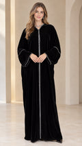 Front full view of black velvet abaya dress with crystal trim