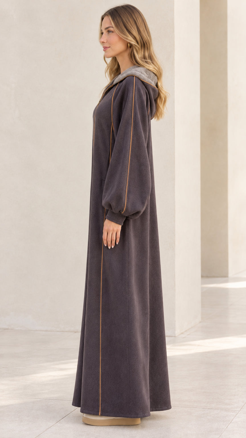 Side profile of model wearing charcoal grey zip-front maxi fleece lounger