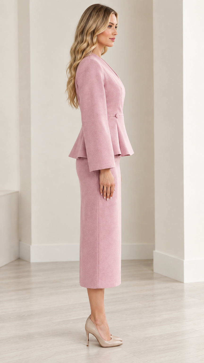 Side profile of dusty pink peplum skirt suit set
