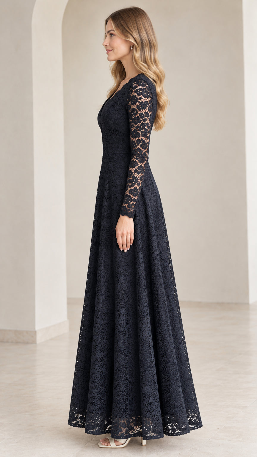 Side angle view of model wearing Navy Blue floral lace evening gown