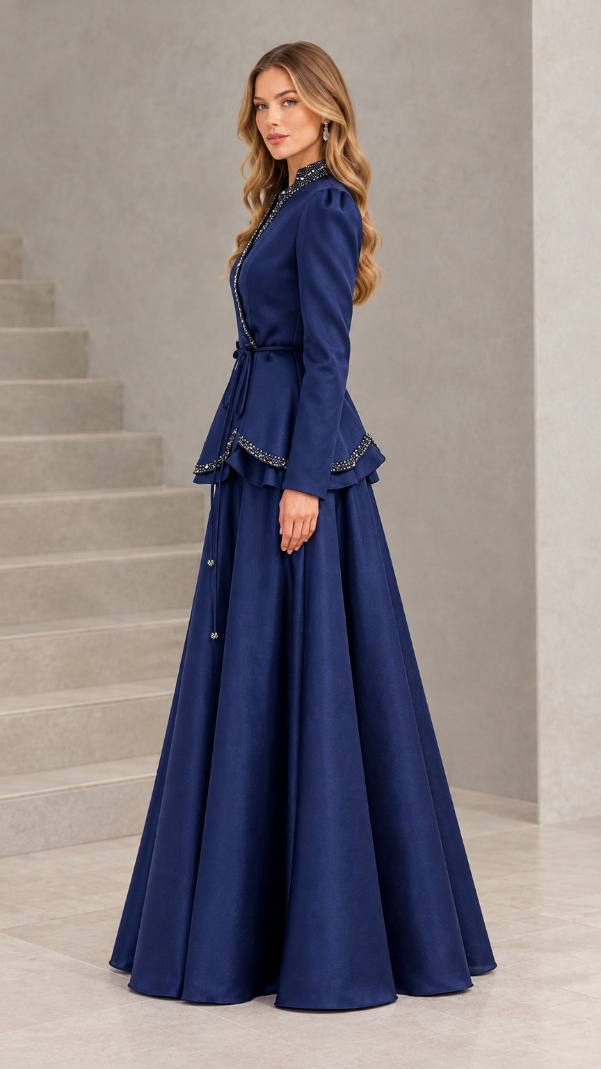 Side profile of model wearing Navy Blue beaded peplum evening gown
