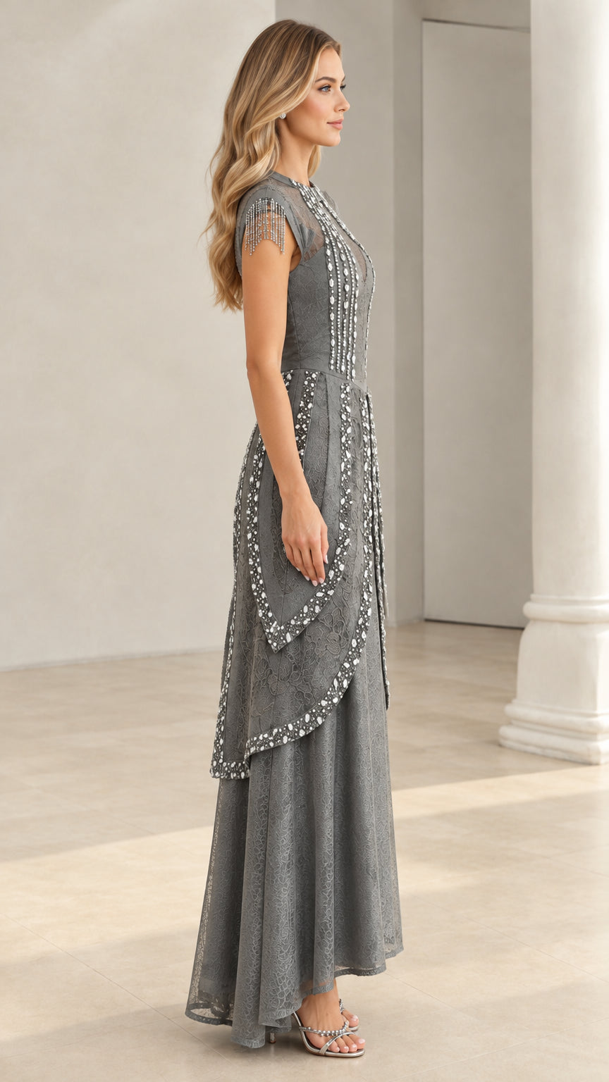 Side view of slate grey floor-length formal lace gown