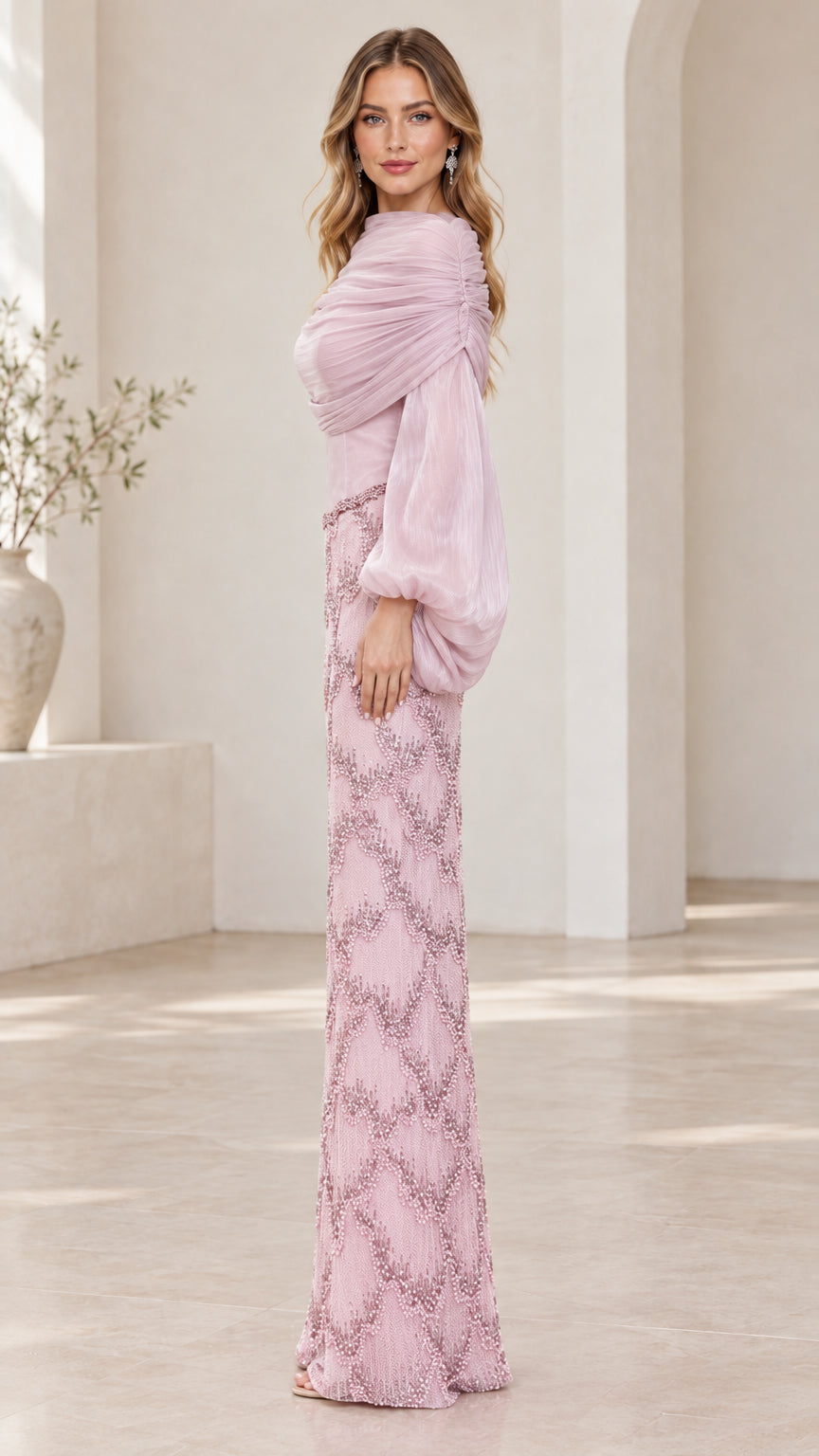 Side profile of dusty pink long sleeve beaded formal evening maxi gown