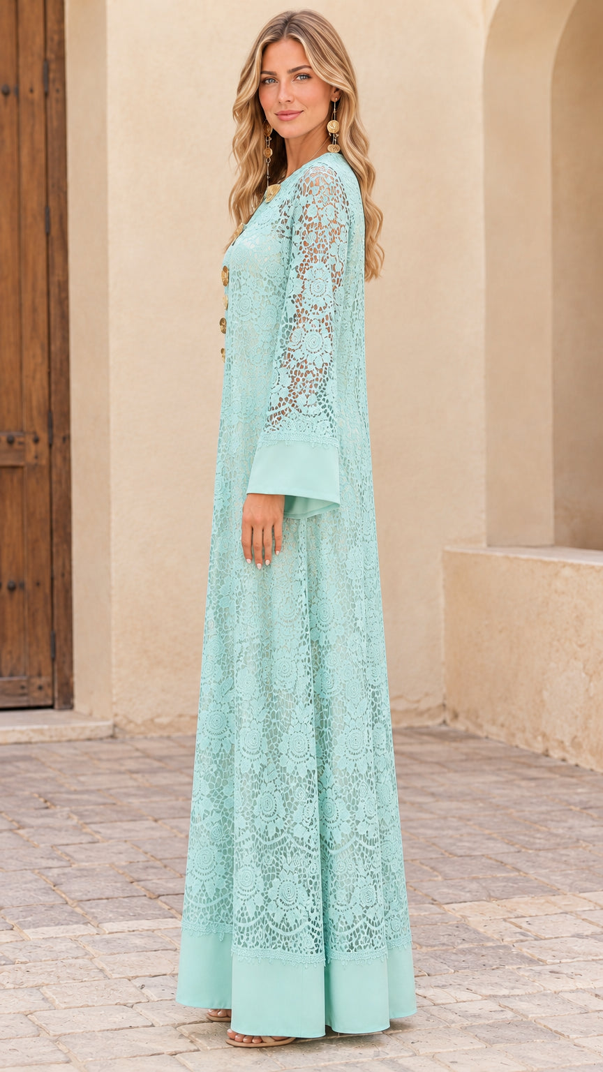 Side view of model wearing Mint Green floral lace long sleeve maxi dress