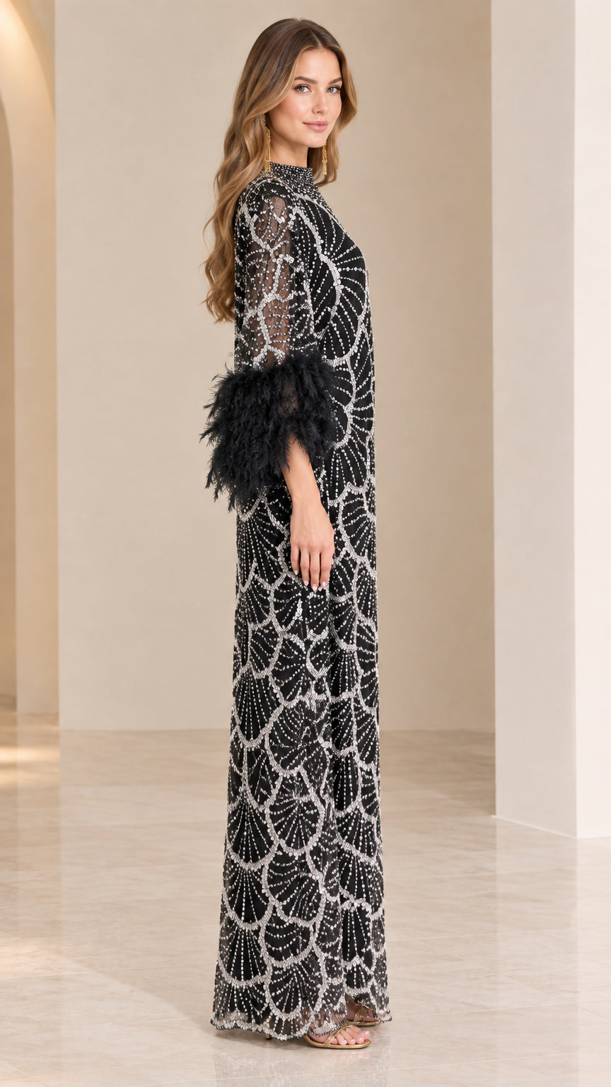Side profile view of black sequin embroidered evening gown with feather sleeve trim