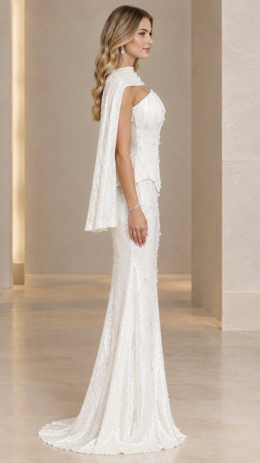 Side profile of white sequined formal dress and capelet
