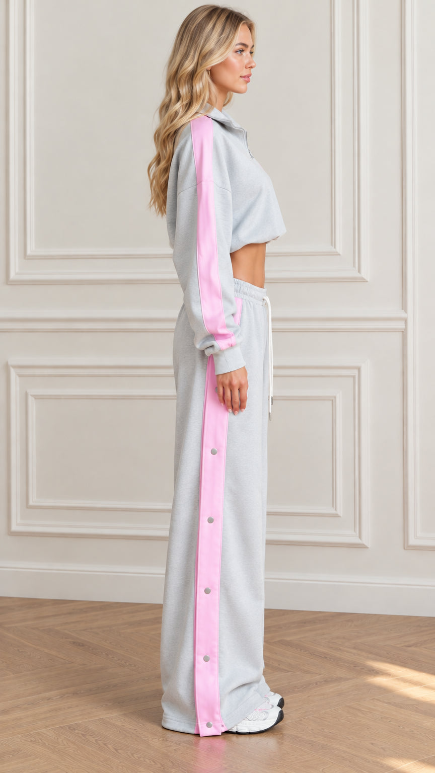 Side profile view of Heather Grey cropped sweatshirt and snap button pants set