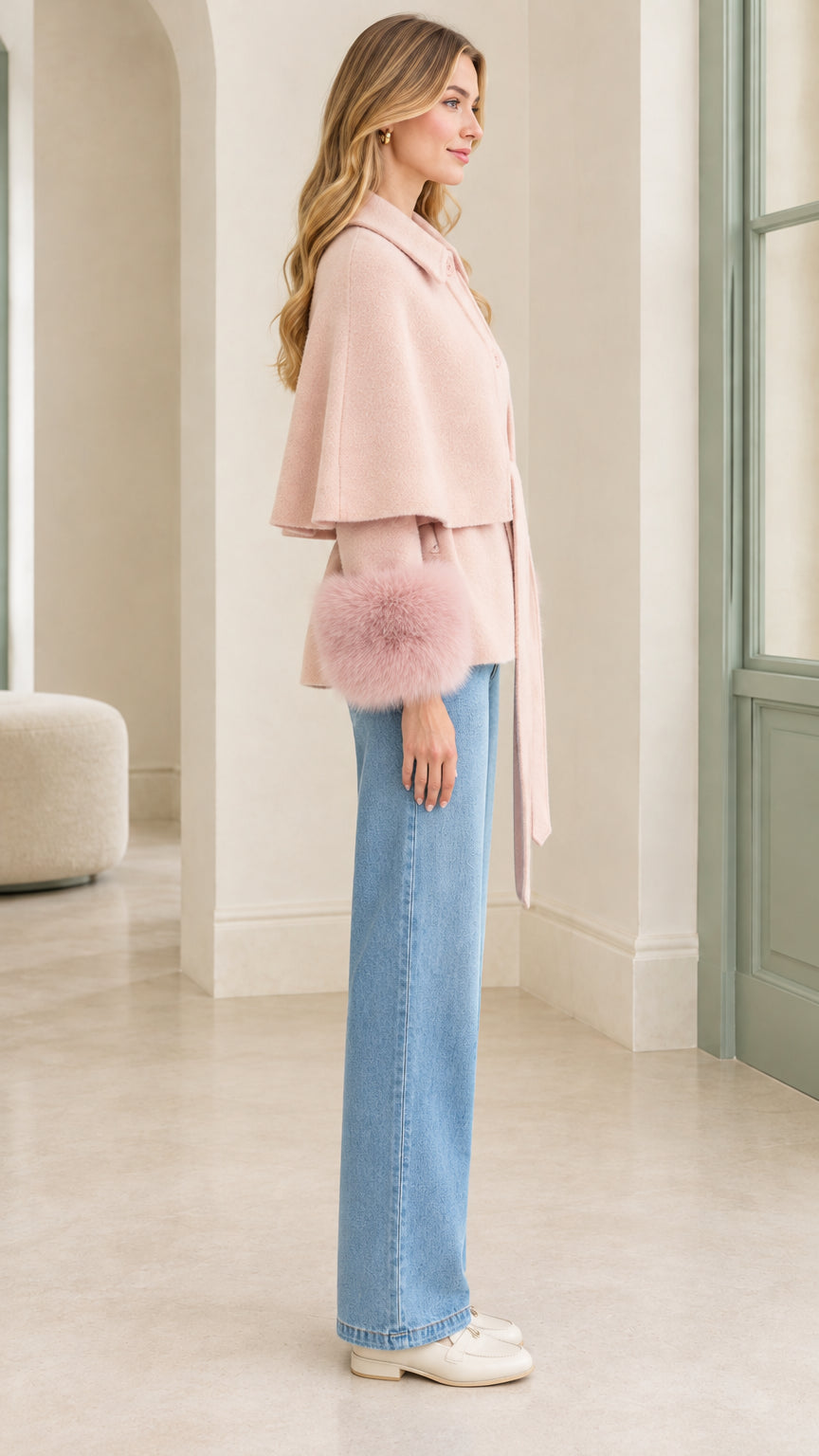 Side profile view of Blush Pink faux fur cuff cape jacket