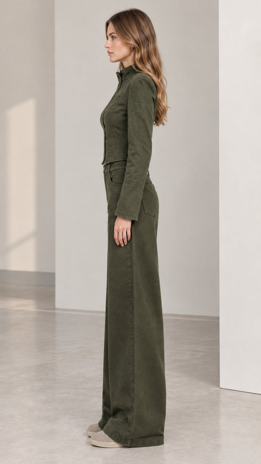 Side profile of model wearing olive green utility co-ord pant set