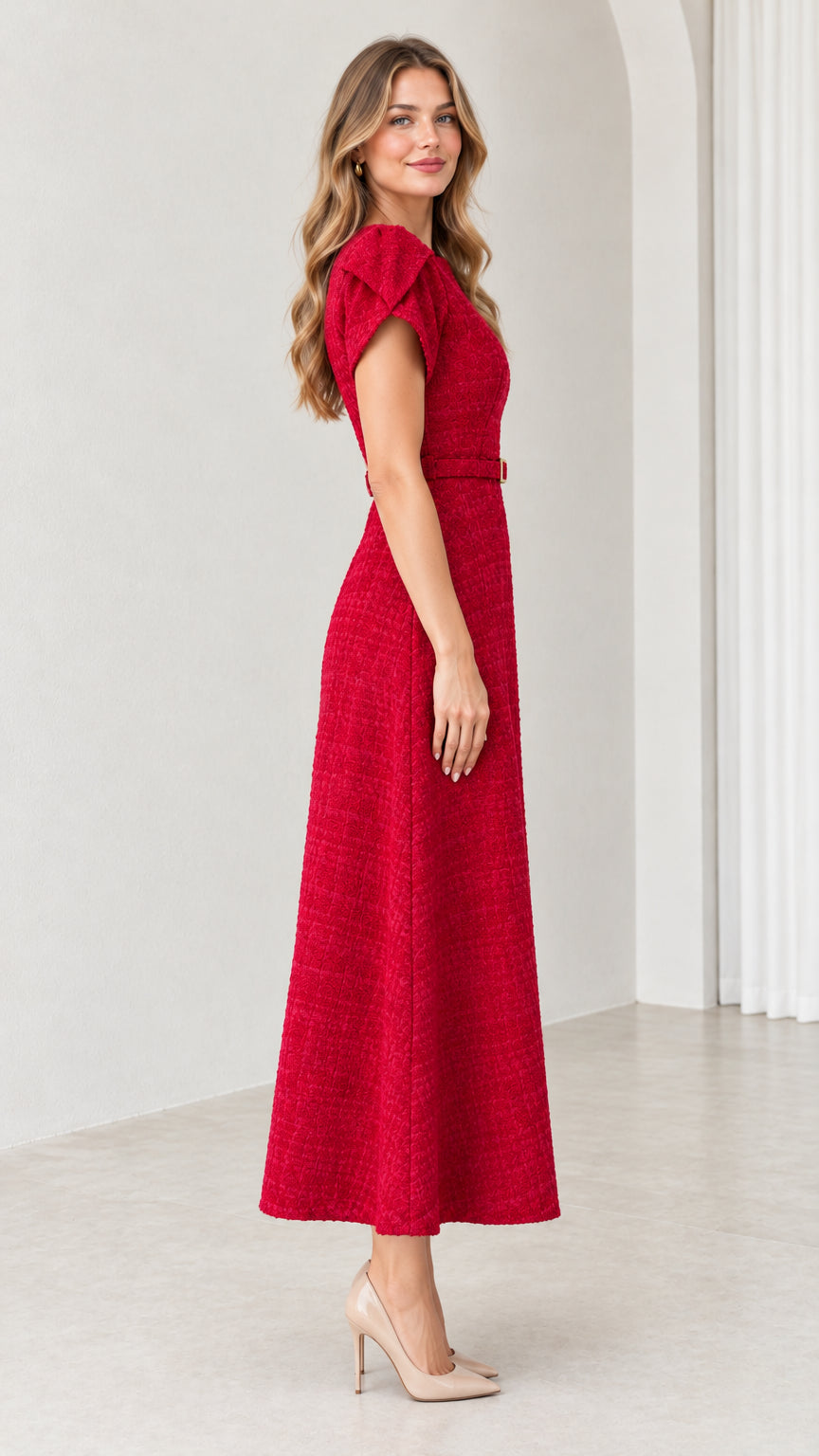 Side profile view of woman wearing red short-sleeve tweed midi dress