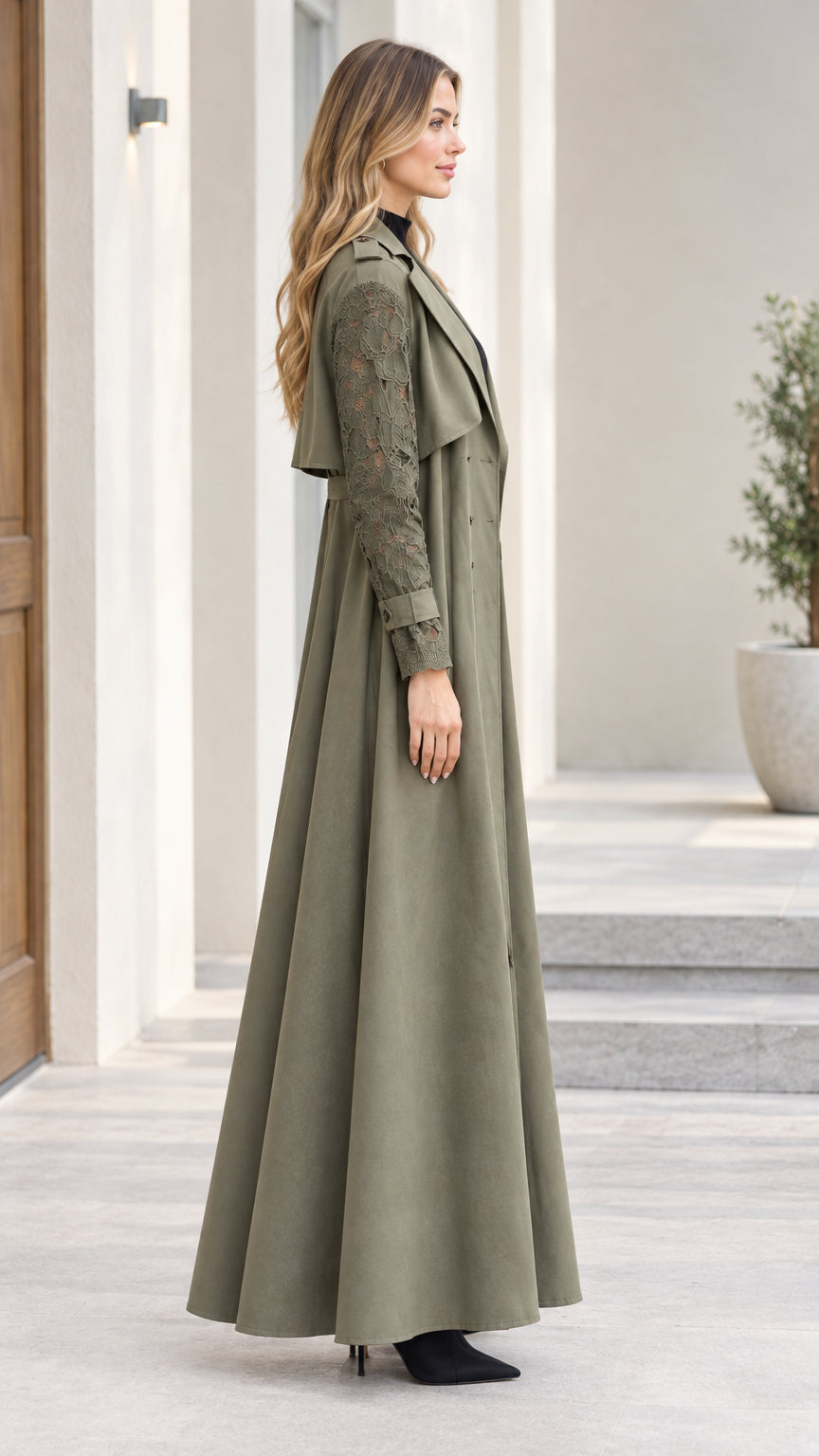 Side profile view of olive green floor-length belted trench coat with floral lace sleeves