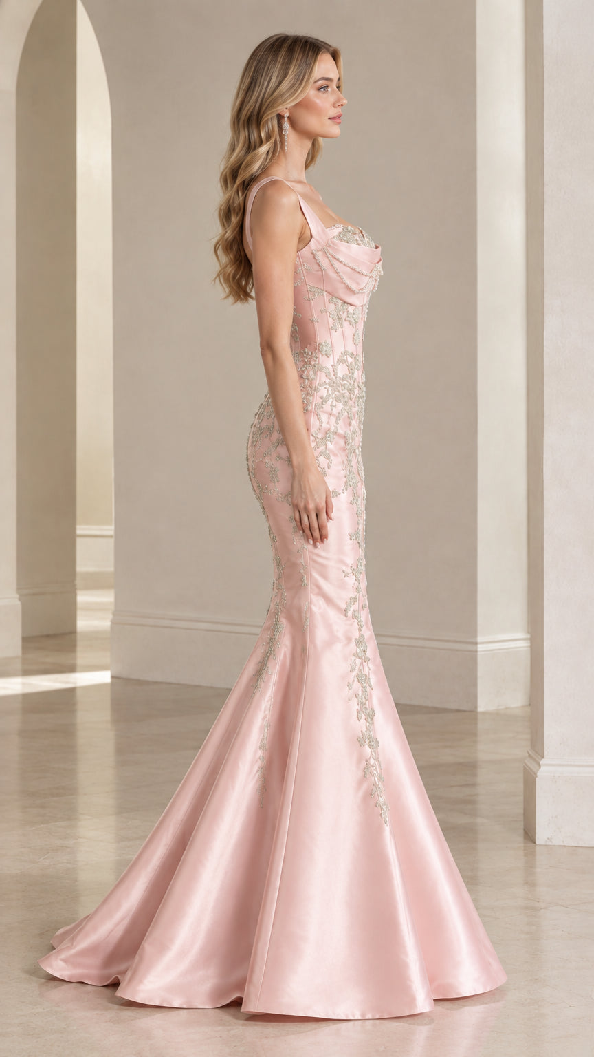 Side profile view of blush pink satin mermaid evening dress with train